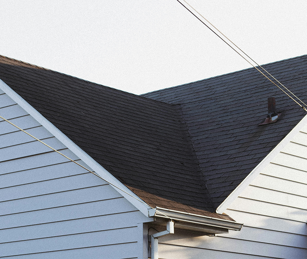 A shingle roof with metal flashing