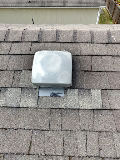 A new vent with flashing installed.