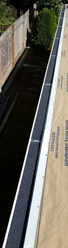Gutter guard protection being installed.