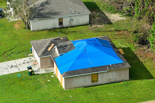 A home with emergency tarping.